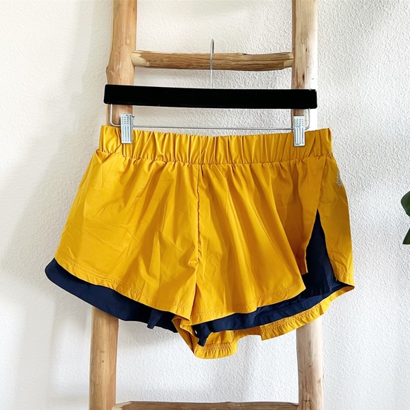 Free People Movement Run For It Mustard Yellow and Navy Shorts NWOT - Picture 2 of 10